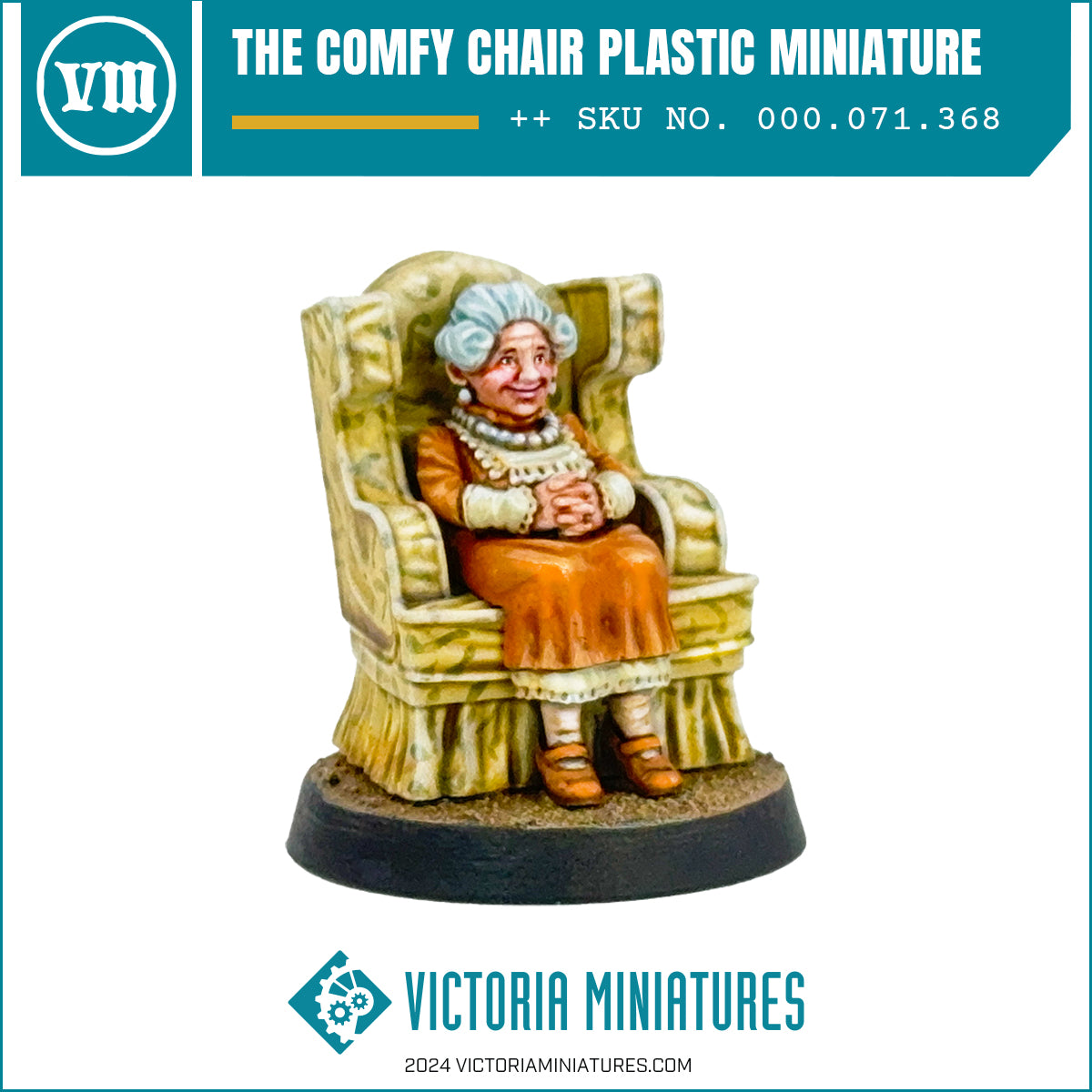 A plastic miniature figurine of an older woman seated in a chair, produced by Victoria Miniatures.